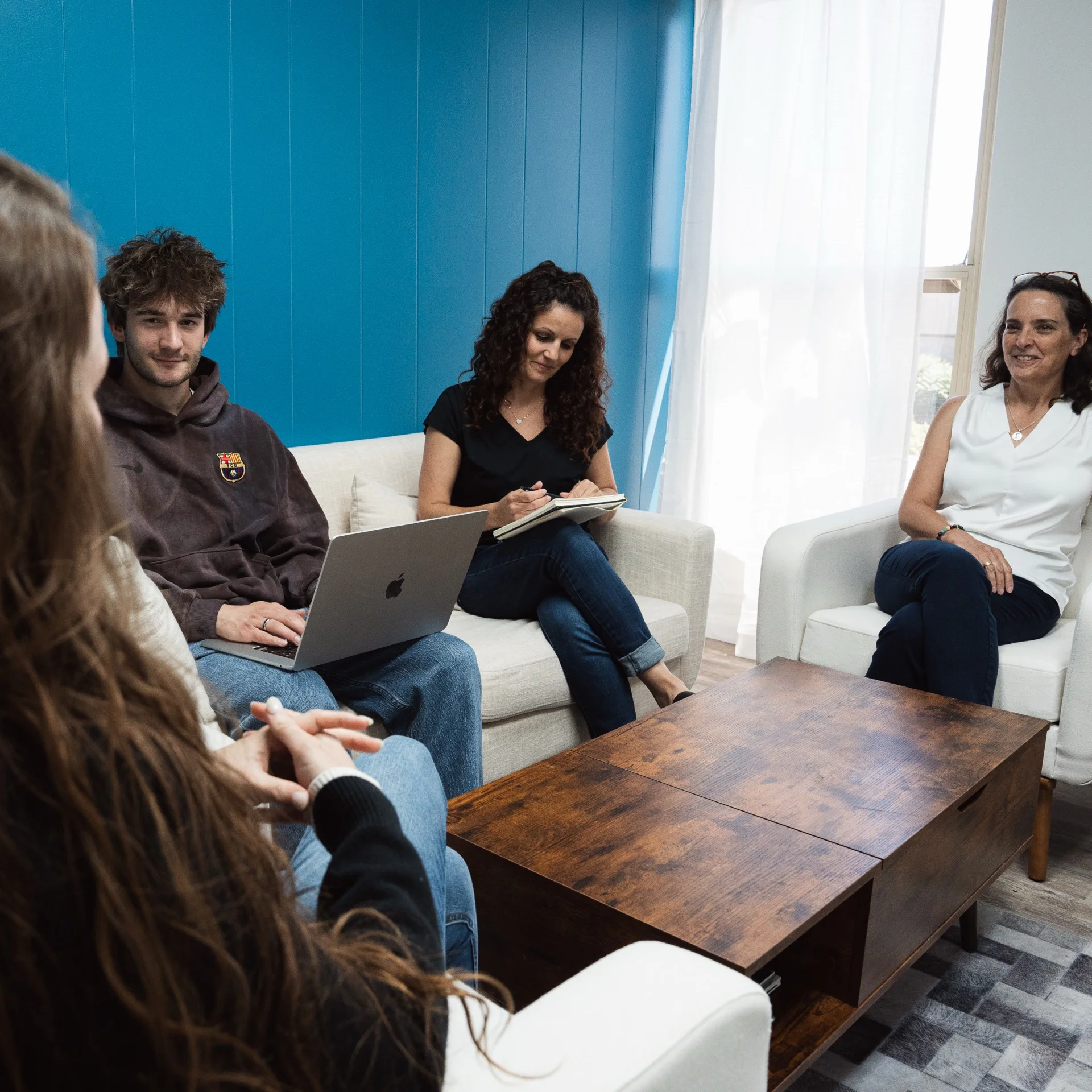 Hannah, Maria and Alex of Vigilante Media collaborating on SEO strategy at their Dayton office