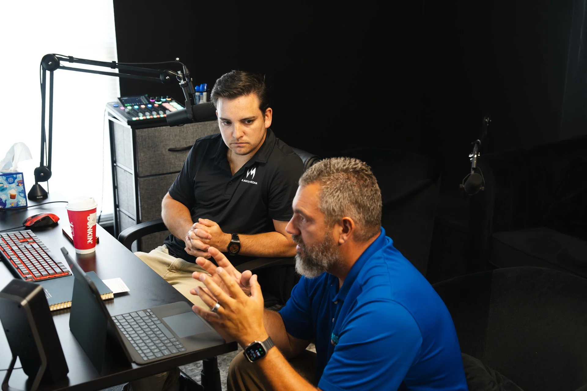 Vigilante Media team working in office